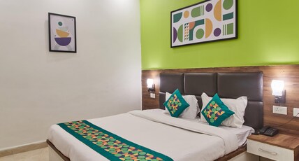 Treebo Chanakya Palm Room Type - Deluxe Room