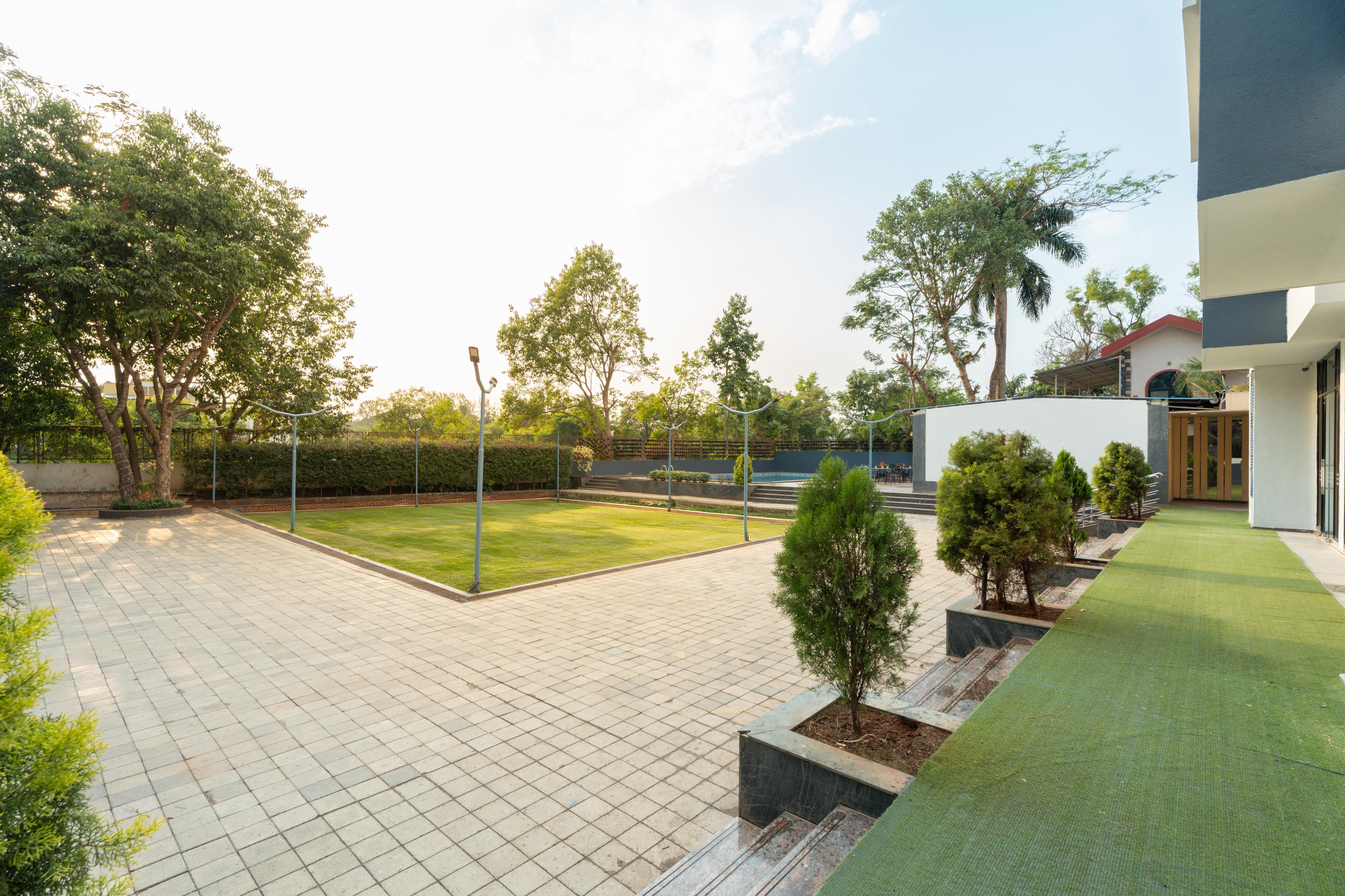 Treeo Resort Lonavala Pure Veg & Lawn - Tap to explore photos