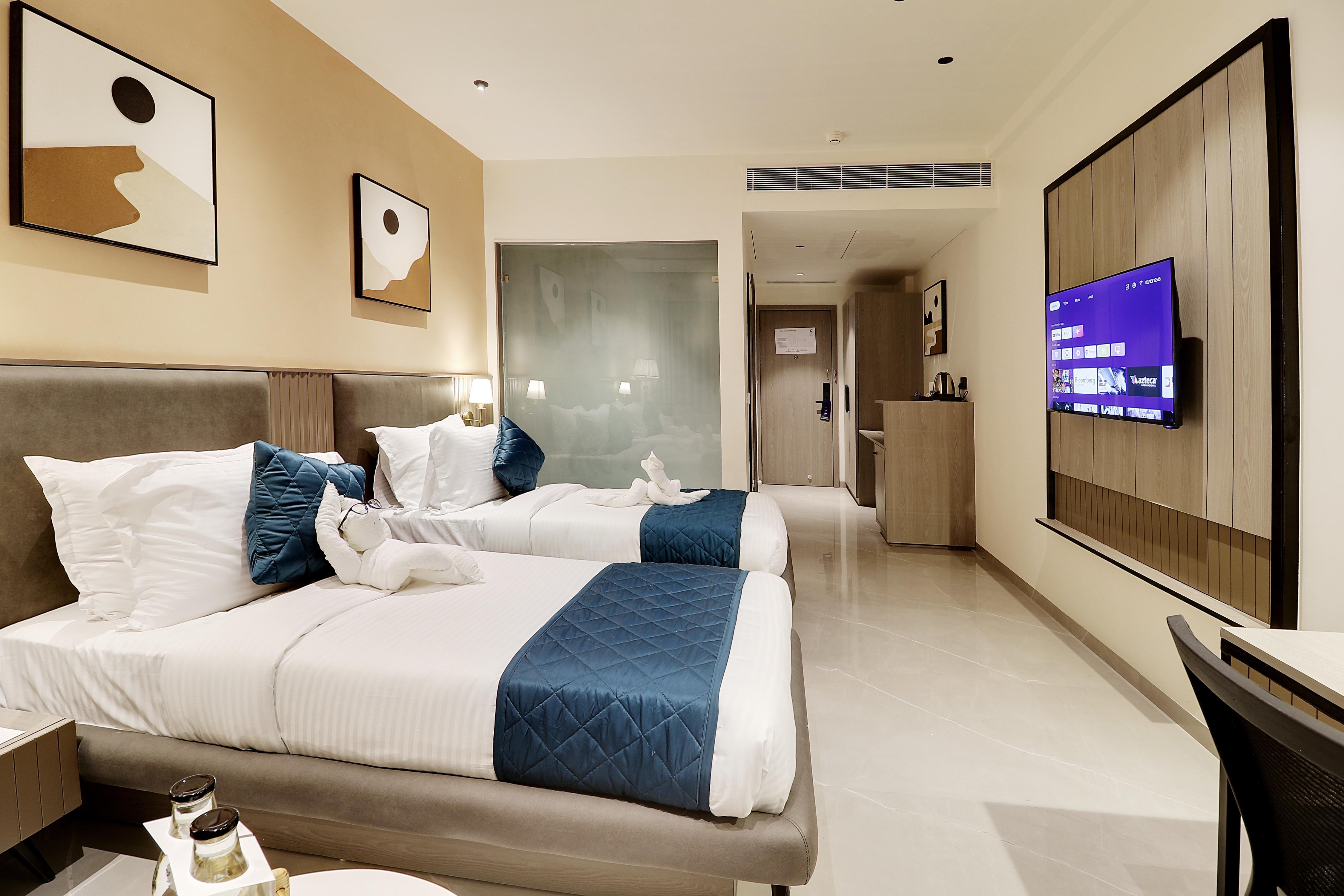Comfort Inn Empire, Morbi - Tap to explore photos