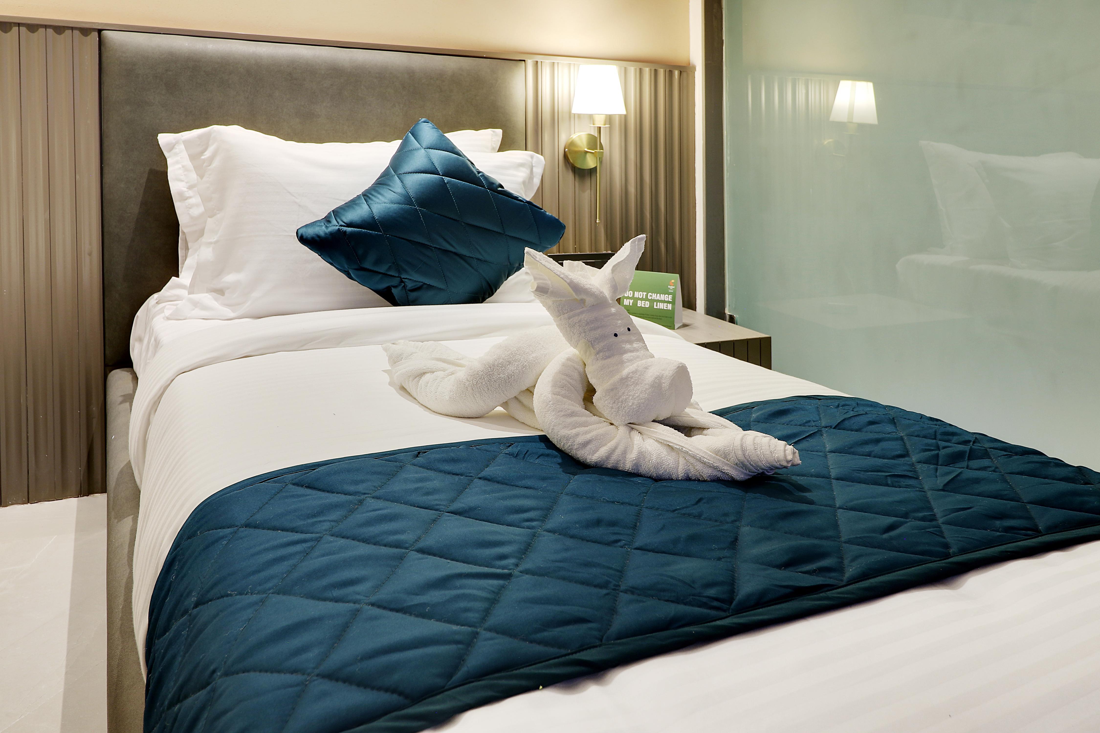 Comfort Inn Empire, Morbi - Tap to explore photos