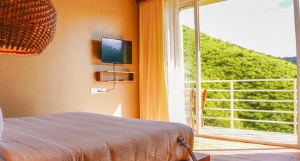 Monkey Tribe Vagamon Room Type - Superior Deluxe AC Room with Balcony and Ensuite Bathroom Monkey Tribe Vagamon Room Type - Superior Deluxe AC Room with Balcony and Ensuite Bathroom