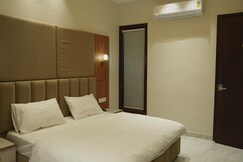 M Raj Hotels