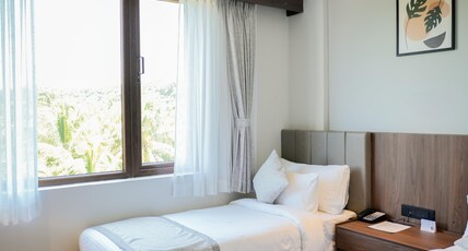 Hotel Pumerai Room Type - Premium Twin Room