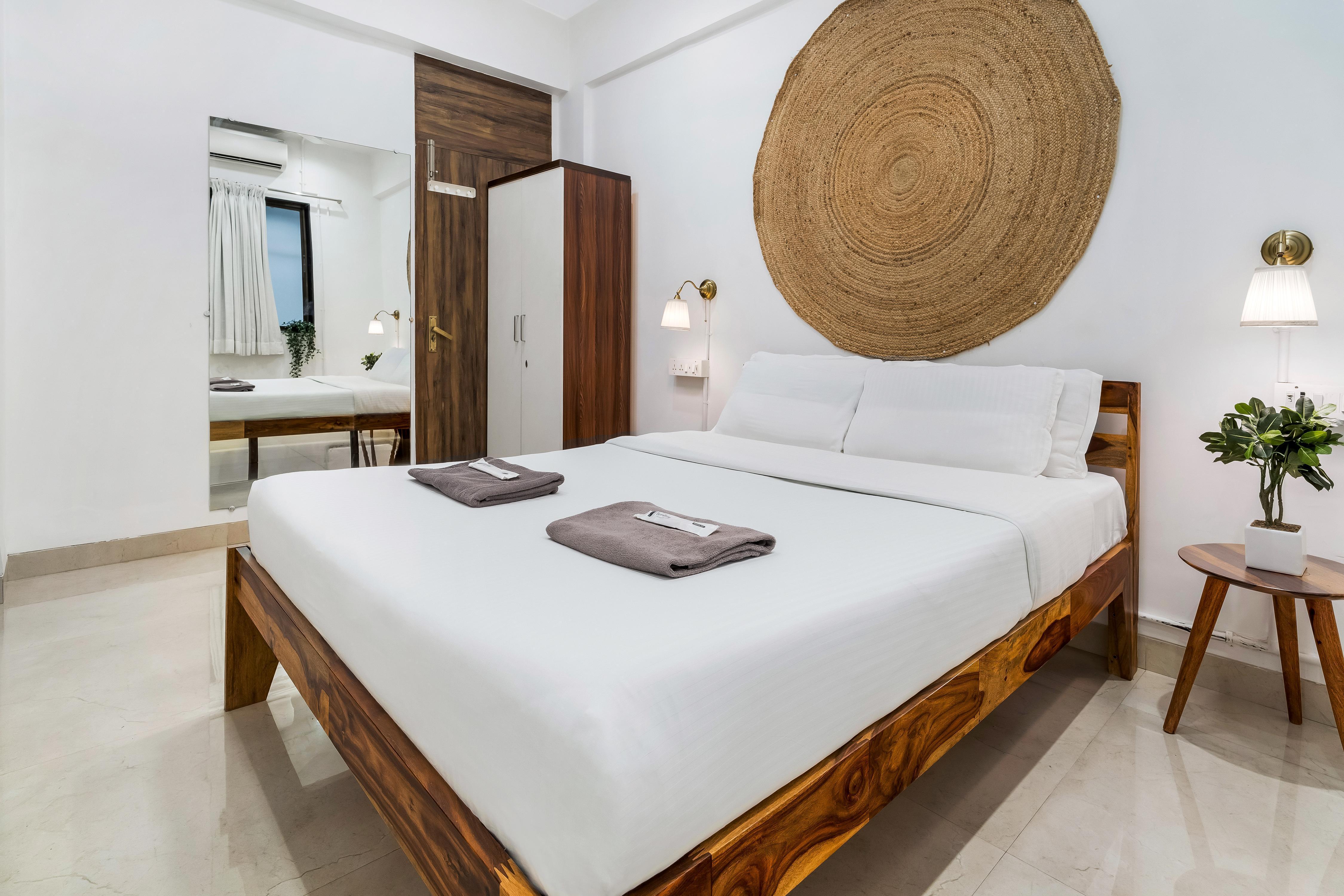 Earthy 1BHK - Tap to explore photos