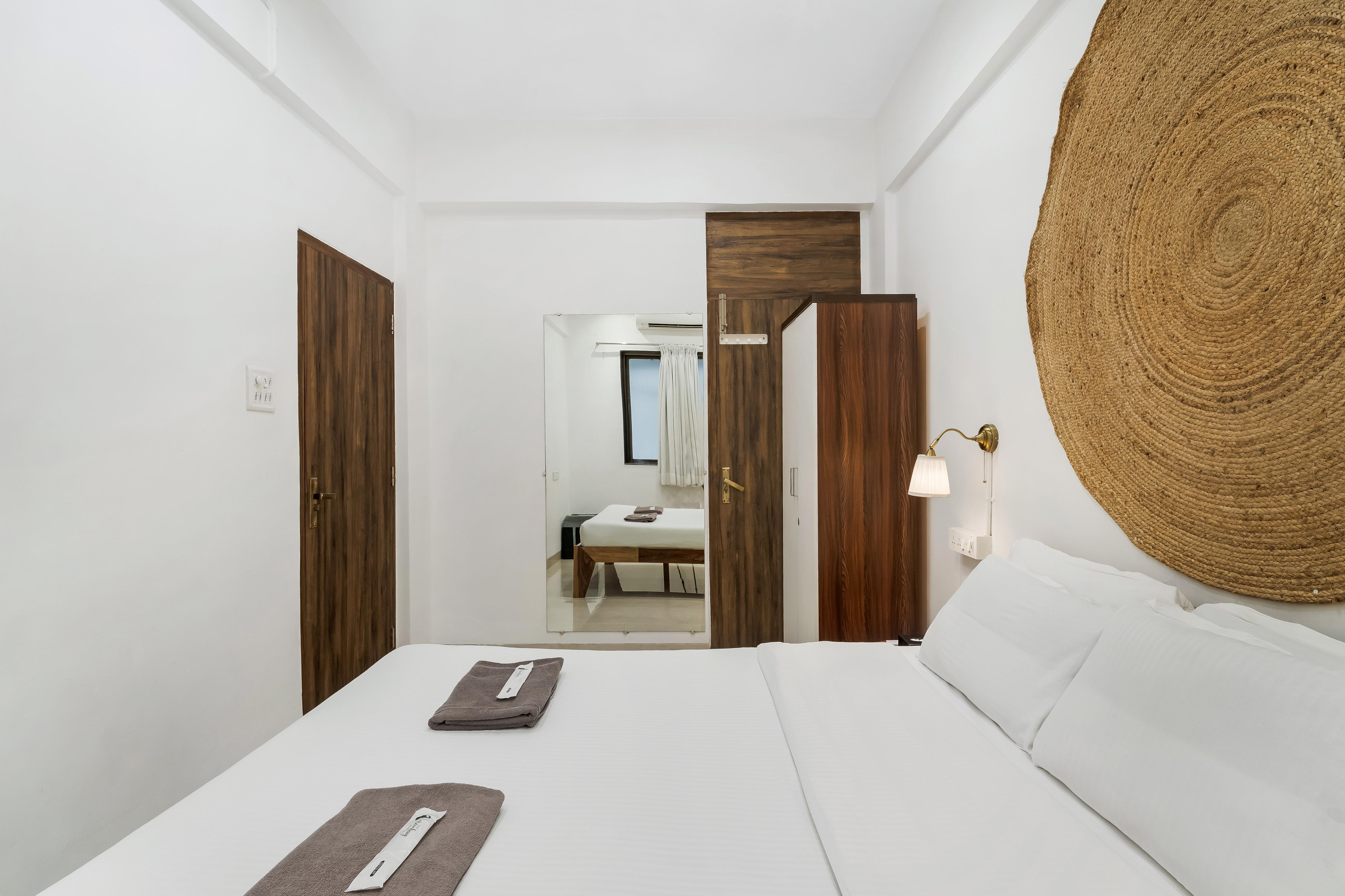 Earthy 1BHK - Tap to explore photos