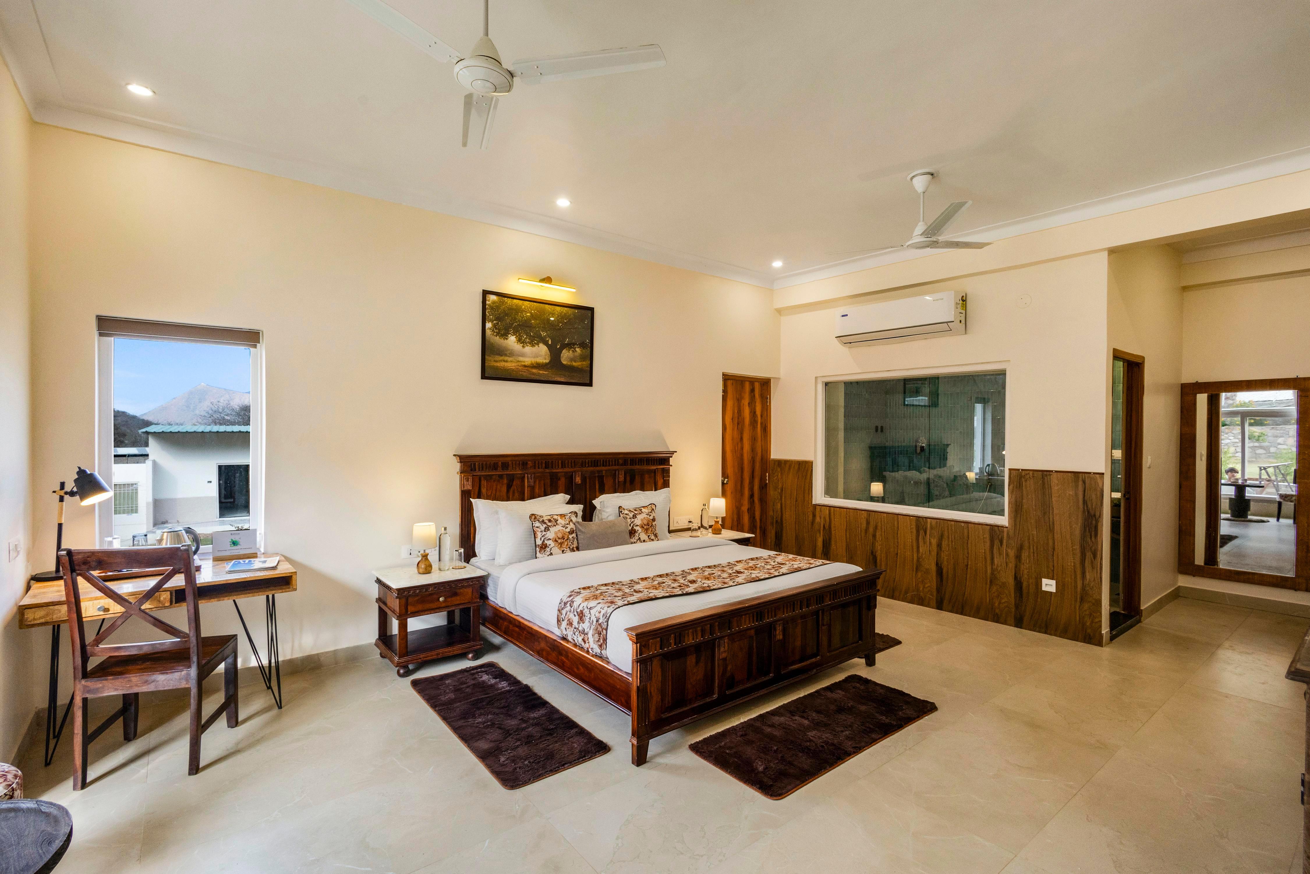 ELIVAAS Signature Mandovar 4 Room Suite with Common Pool & Garden - Tap to explore photos