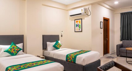 Treebo Nova Near Hyderabad Airport, Shamshabad Room Type - Spacious Mahogany Room with Sofa and Fridge
