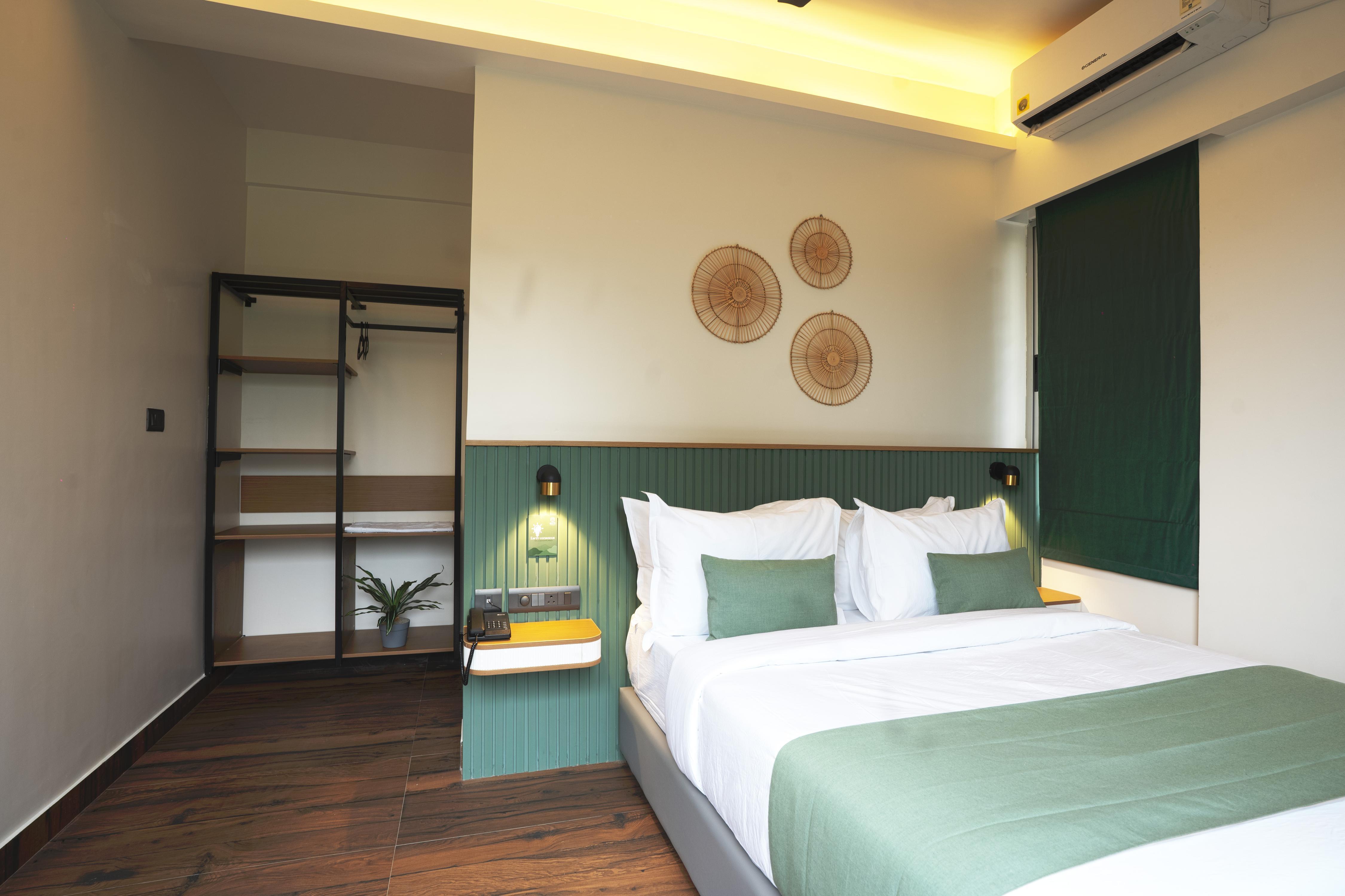 Earth Hotels Hebbal - Tap to explore photos