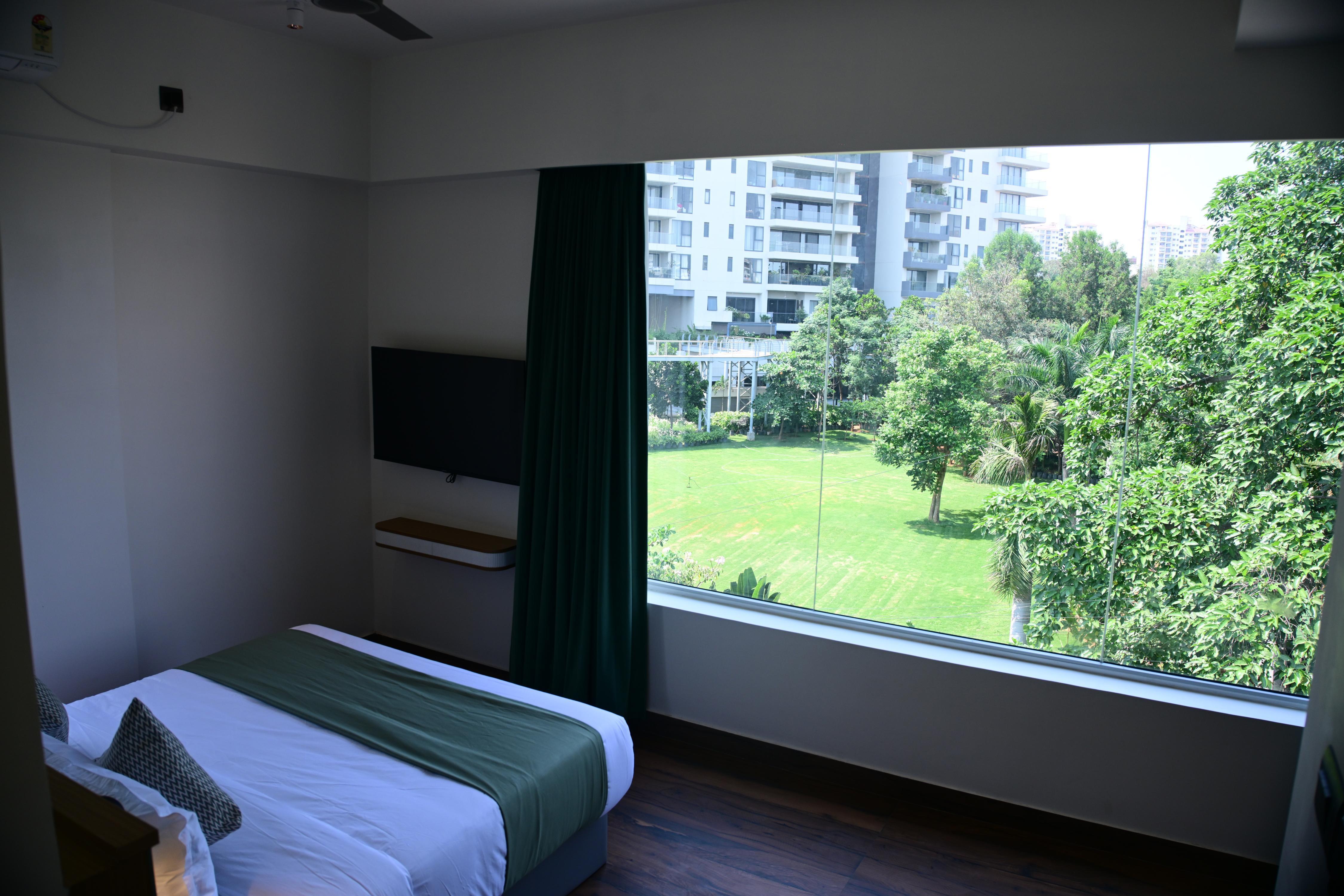 Earth Hotels Hebbal - Tap to explore photos