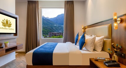 Hotel Ambalika Aashray | A unit of Maa Chaya Group Room Type - Deluxe Room With Mountain View