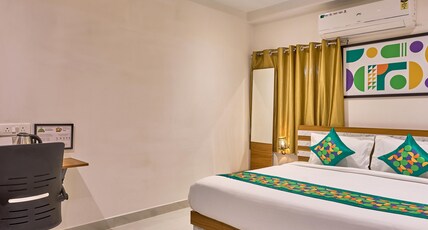 Treebo Saffron Suites, Near Financial District & US Consulate Room Type - Deluxe Room