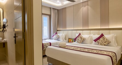 Hotel Holiday Homez Room Type - Premium Family Room with 2 Queen beds