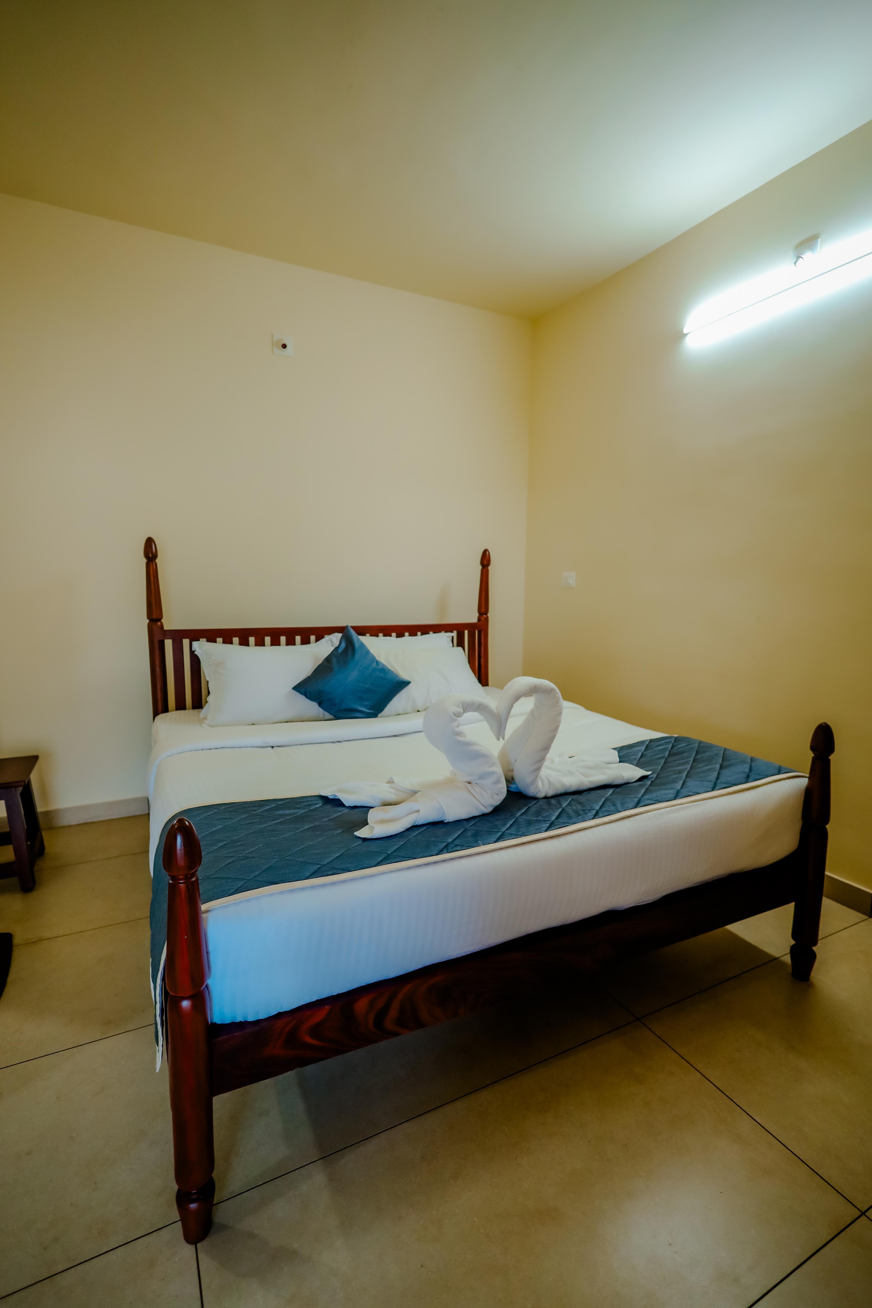 Akruthi Palm Pavilion Resort Room Type - Deluxe Room