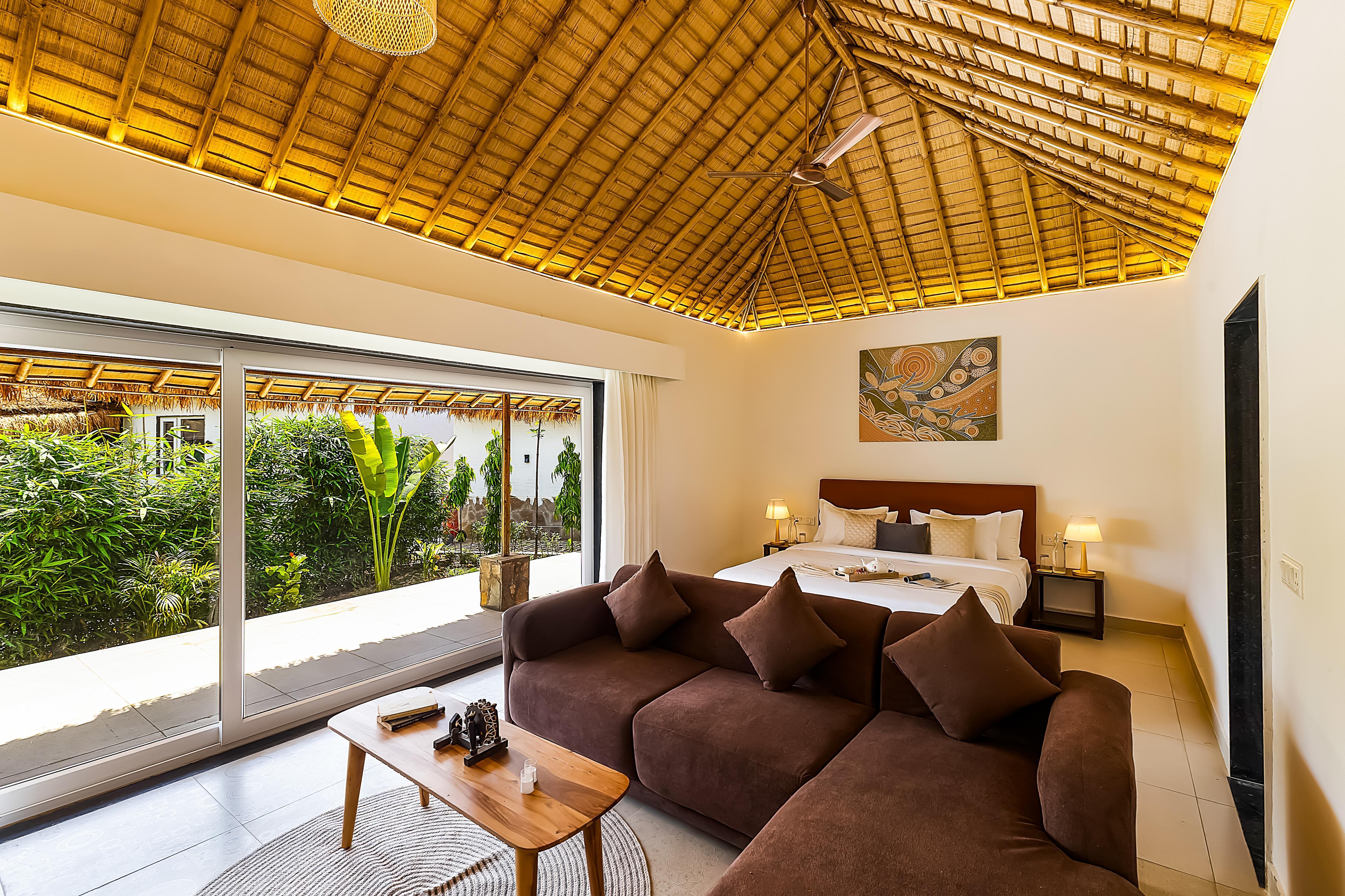 ELIVAAS Signature Kimaya | Suite With Shared Game Zone - Tap to explore photos