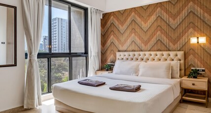 OV Premium Studio Apartment near BKC by SquareOne Stays Room Type - Emily