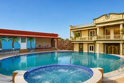Gold Palm Resort by Alaya Stays