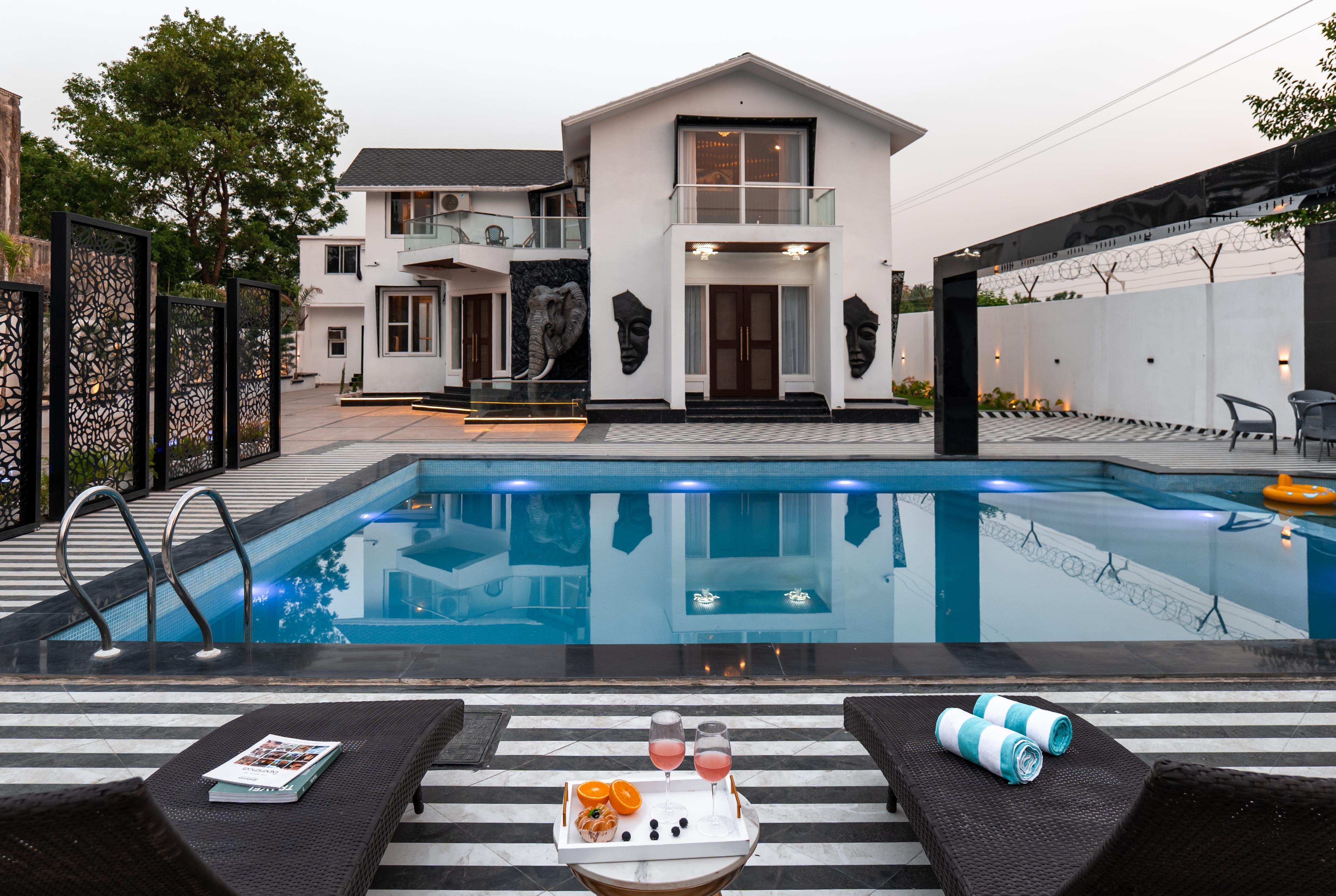 ELIVAAS Signature Raj Farms | 3 BHK Villa with Pvt Pool - Tap to explore photos