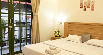 GREEN HORIZON HOMESTAY Room Type - Premium Balcony AC Room