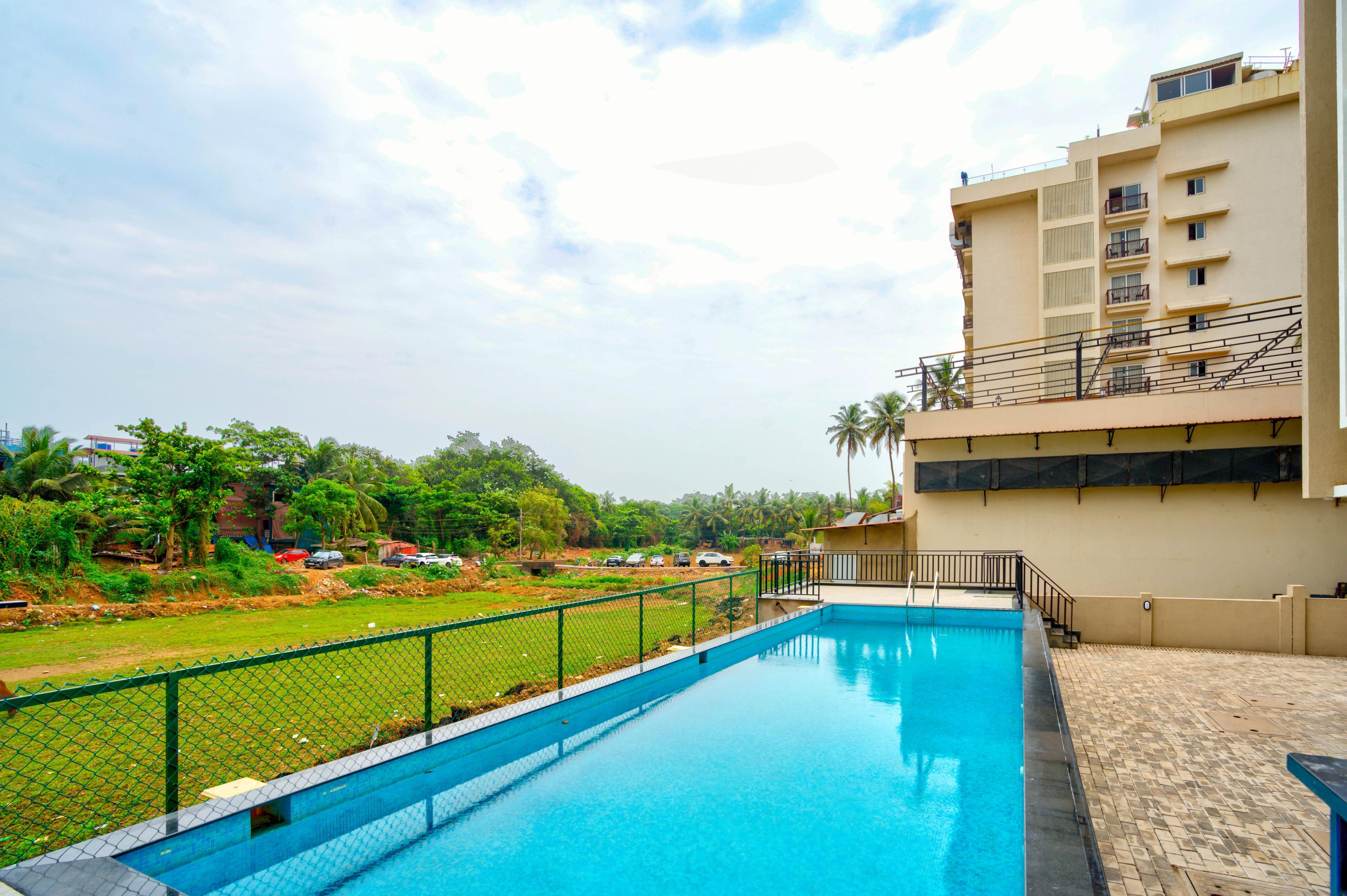 Modern Coastal Stay Candolim Beach - Tap to explore photos