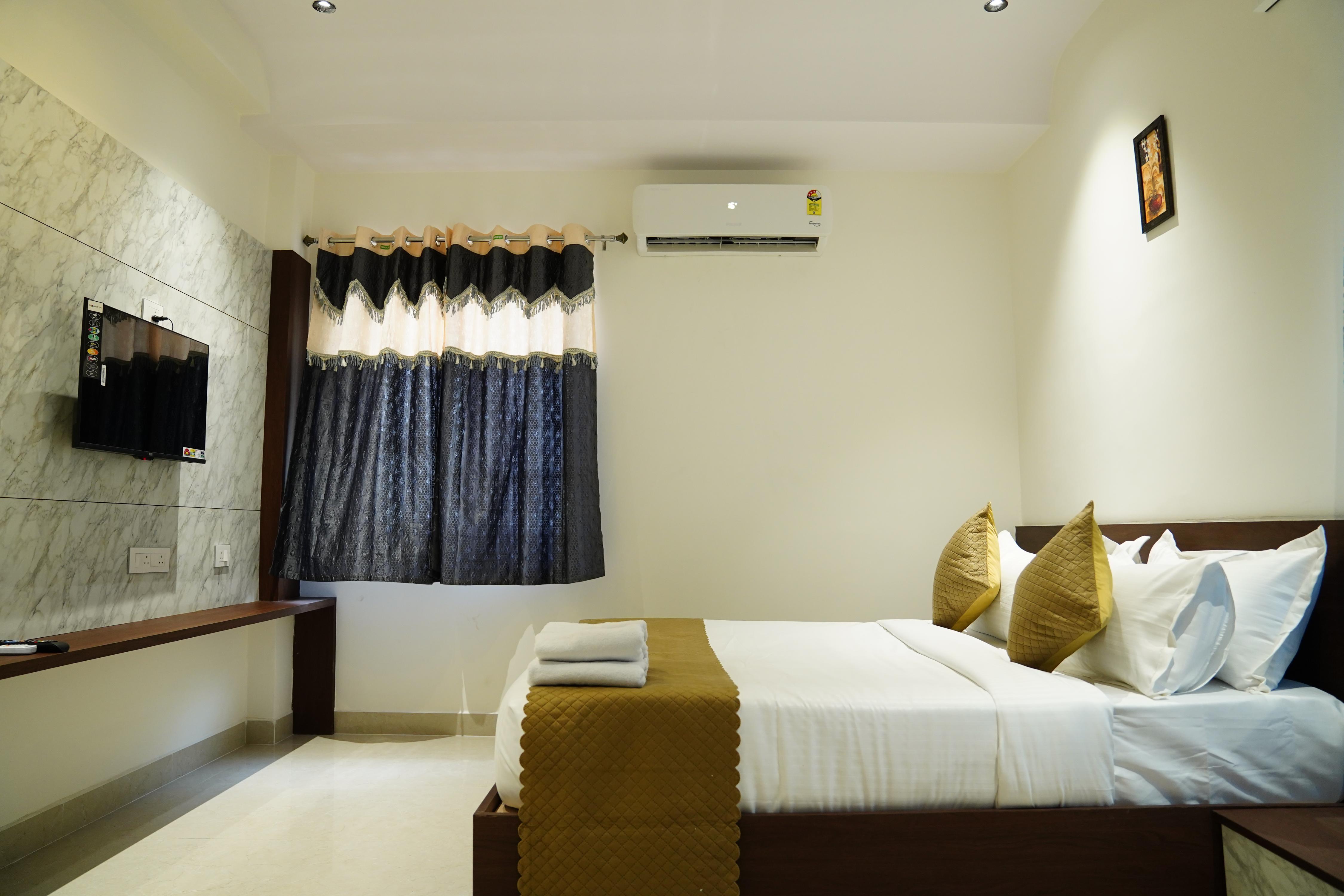 Hotel VijayaComfort - Tap to explore photos