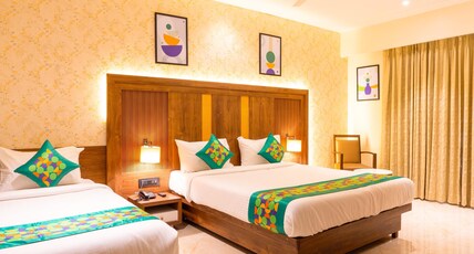 Treebo Premium Merrit Room Type - Deluxe Room