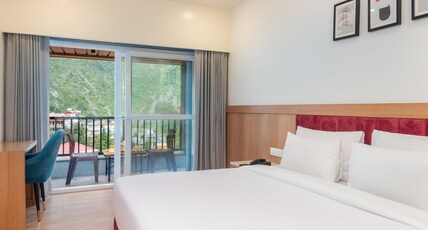 The Kalash by Lawrence hotels Room Type - Premium room with balcony and mountain view The Kalash by Lawrence hotels Room Type - Premium room with balcony and mountain view