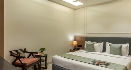 Perfectstayz Premium Vrindavan Room Type - Deluxe Room