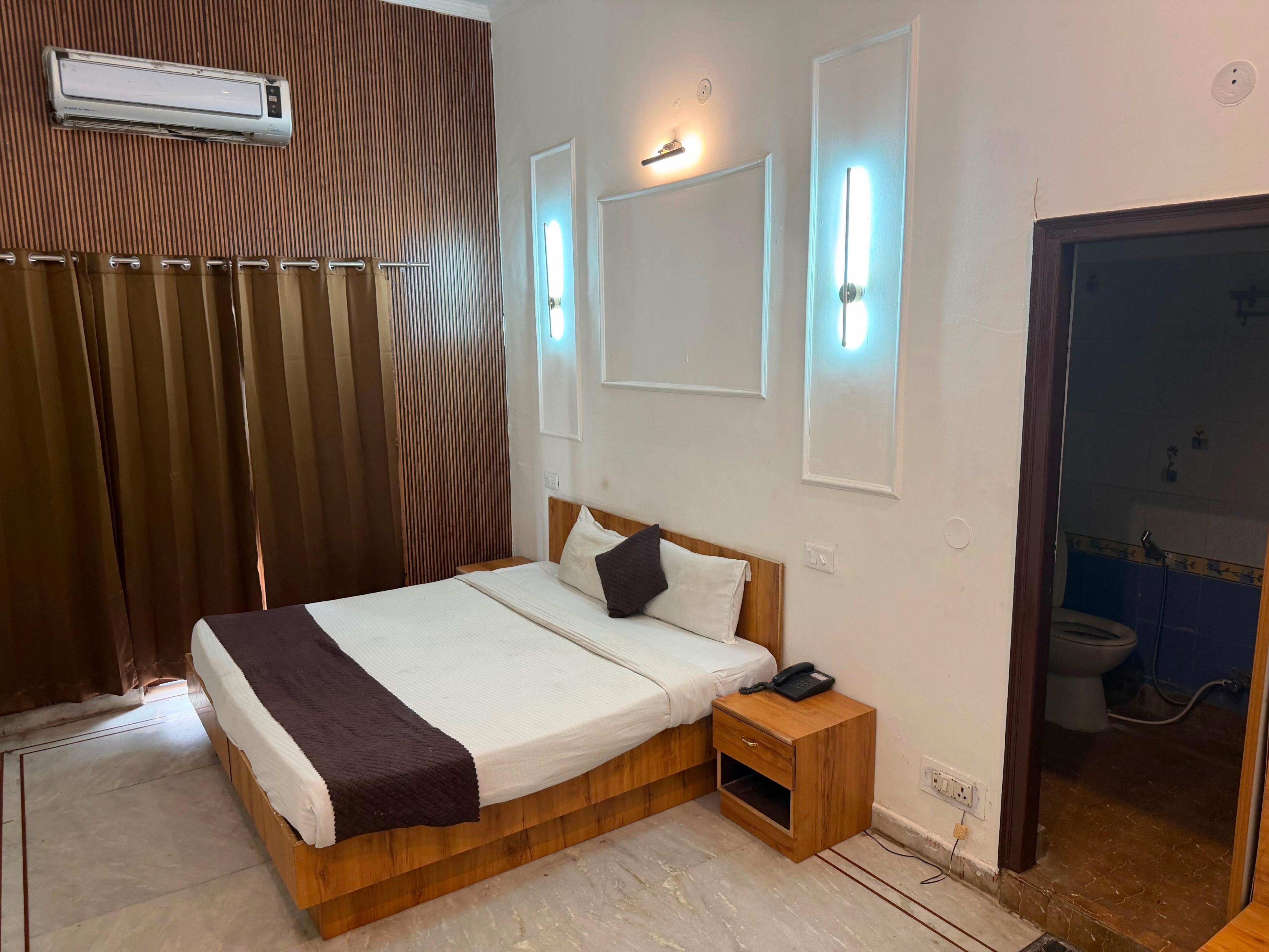 Hotel O Royal Homestay - Tap to explore photos