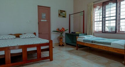 Prakruthi Home Stay Sringeri. Room Type - Comfort Triple Room by Prakruthi Homestay with Parking