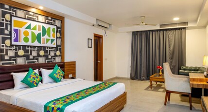 Treebo Parth Paradise Room Type - Premium Room
