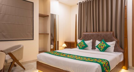 Treebo Premium The Maulshri, Behind Health Vistaar City Room Type - Deluxe Family Room