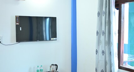 VALLEY OF PINES HOMESTAY Room Type - DELUXE ROOM WITH MOUNTAIN VIES