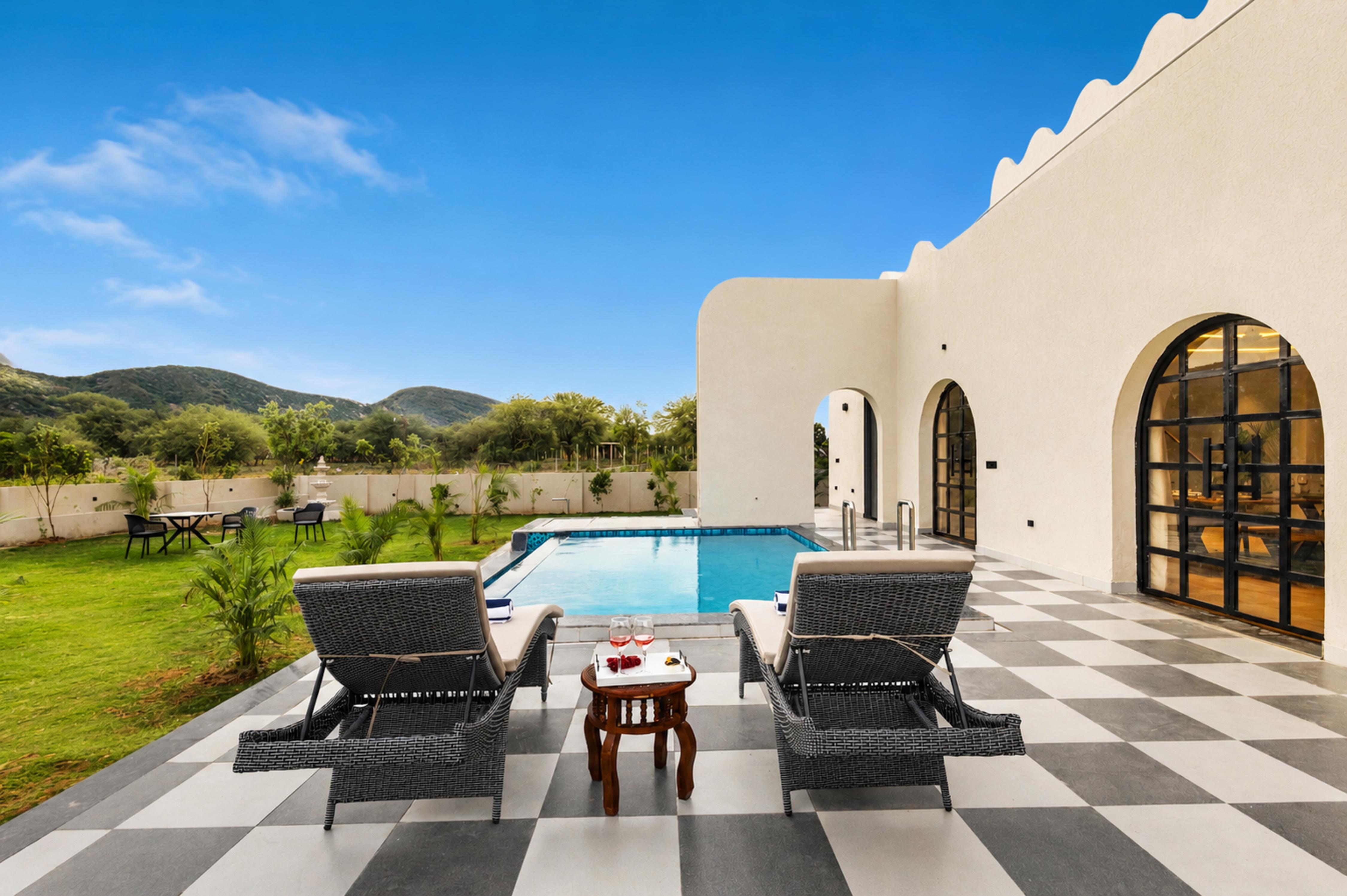 ELIVAAS Signature Belvedere 4BHK Villa with Pool & Garden - Tap to explore photos