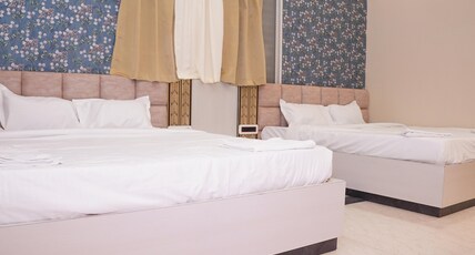 GANGA SAROVAR IN Room Type - Triple bed deluxe room