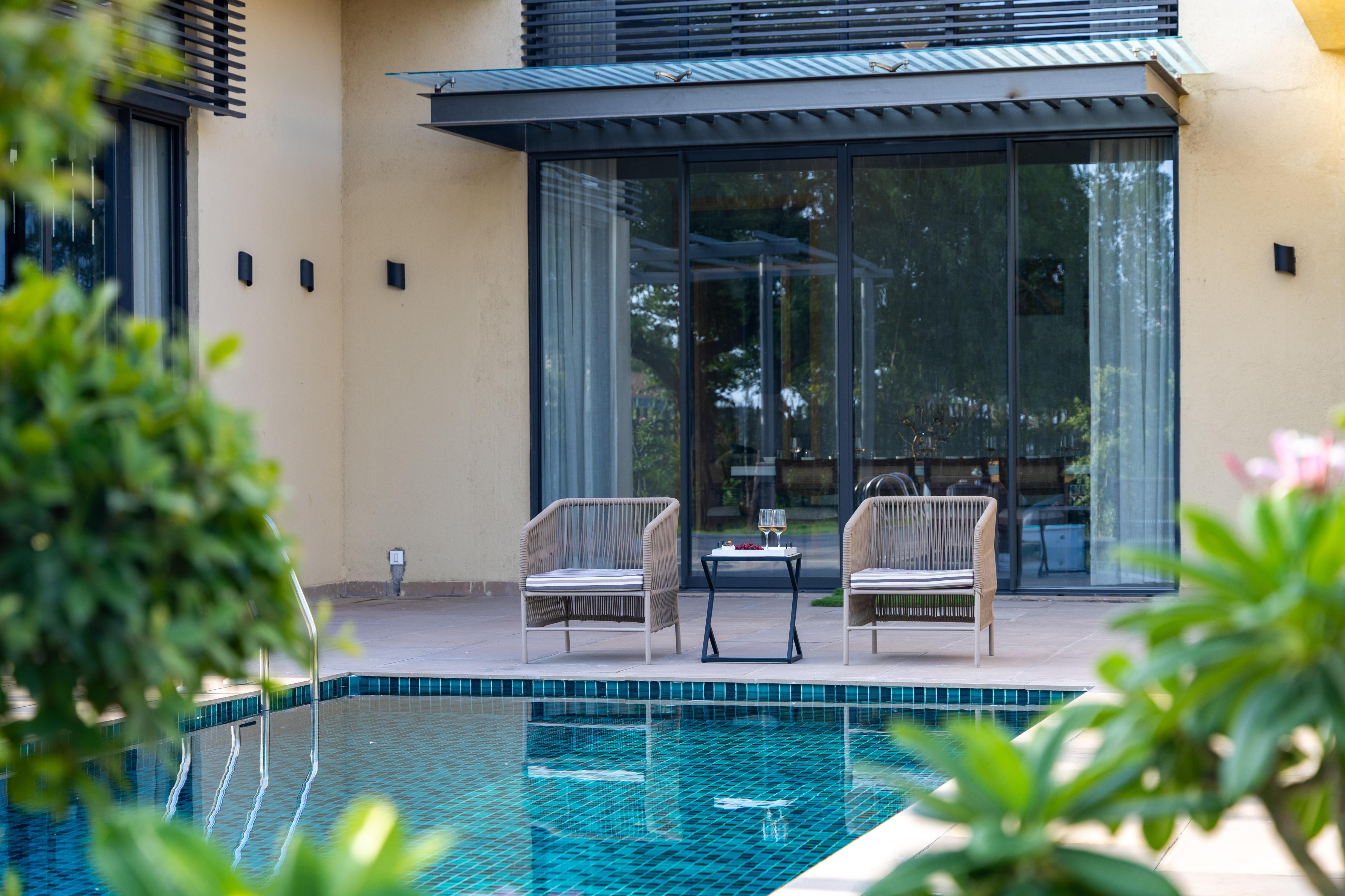 ELIVAAS Signature El Bosque | Spacious 4 BHK Villa With Private Pool - Tap to explore photos