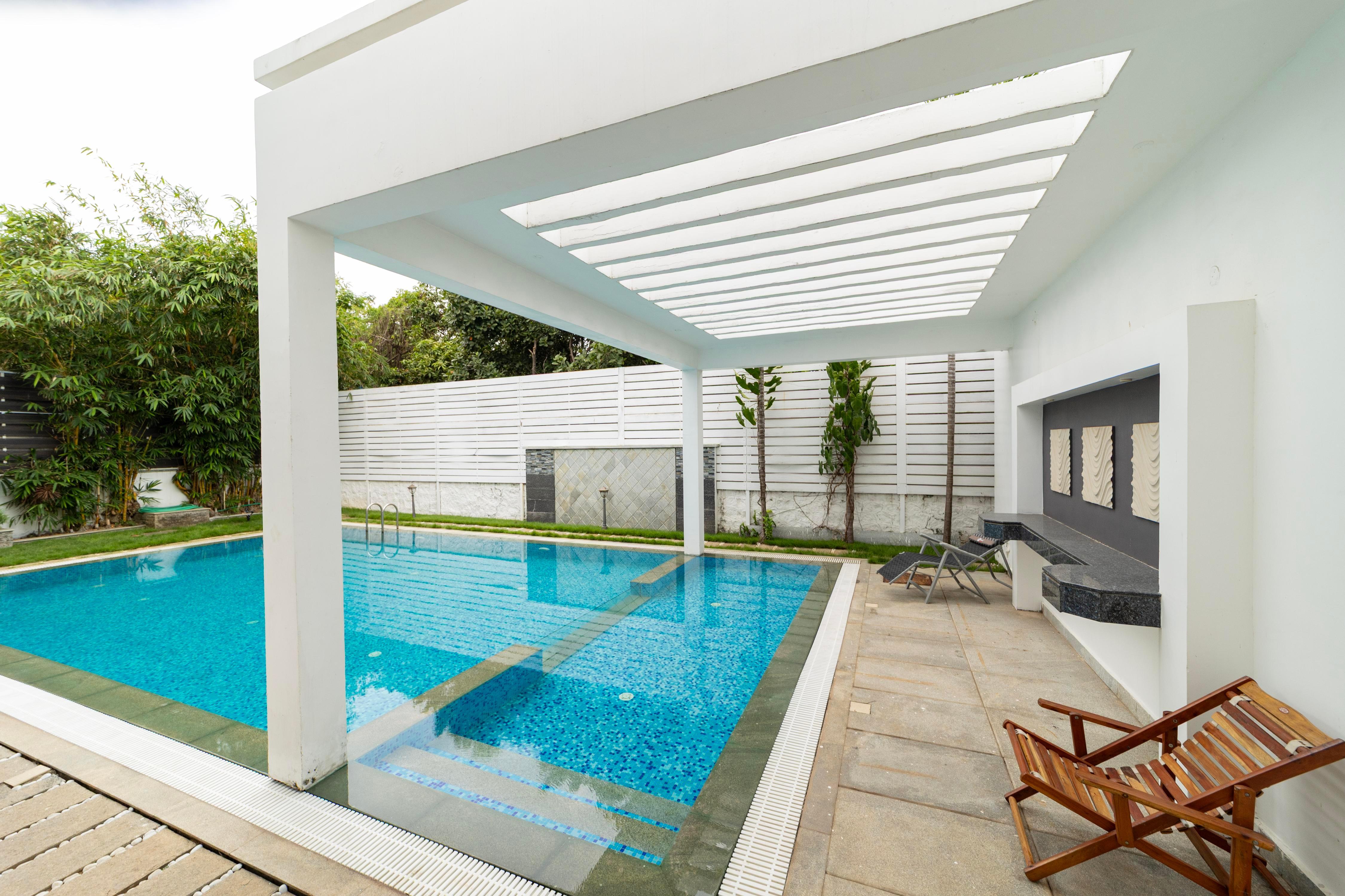 ELIVAAS Gerrys 4 BHK Villa with Terrace & Lounge - Tap to explore photos