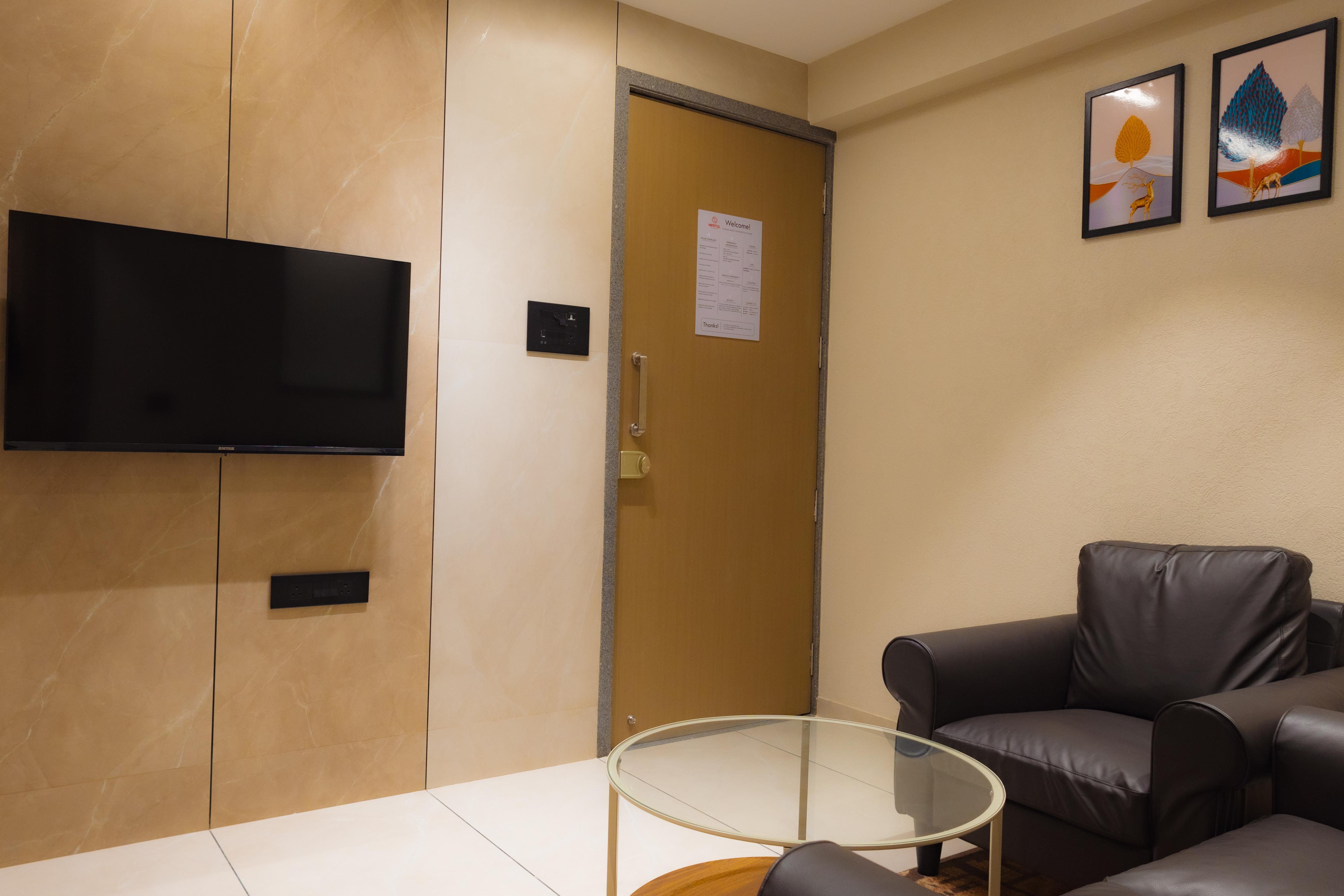 Nirrtul Emerald 1 BHK Apartment Cozy Quite - Tap to explore photos