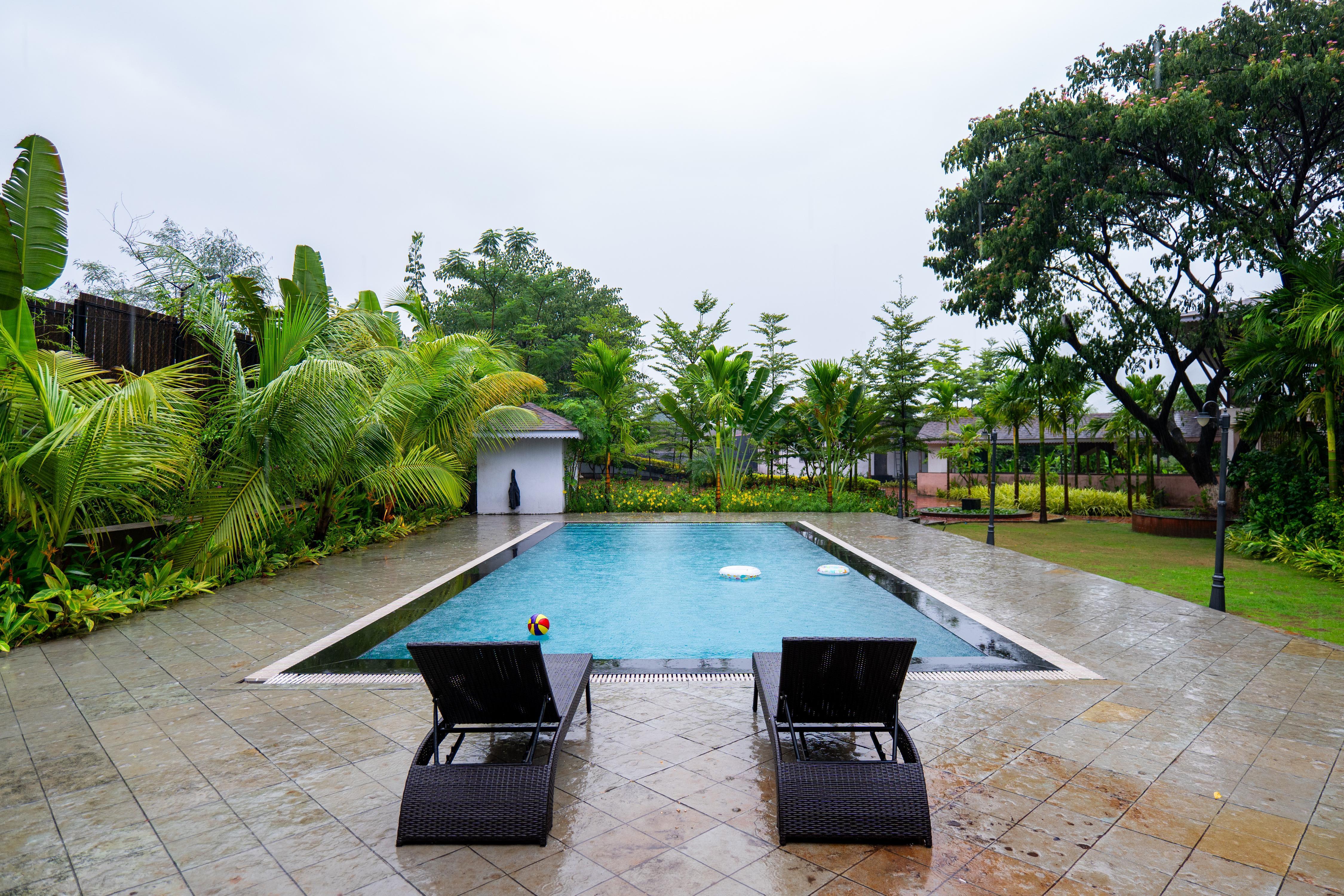 ELIVAAS Signature Aaraa 4 BHK Luxury Vila with Pool & Home Theatre - Tap to explore photos