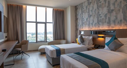 RG Grand Hotel & Convention - Manyata Tech Park Room Type - Deluxe Twin Room