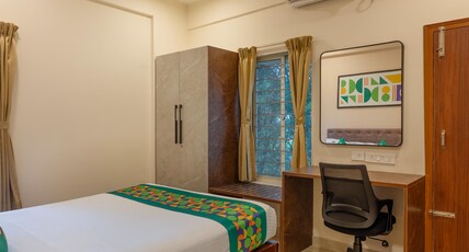Treebo Emirates Suites - Near Wipro Sarjapur Road Room Type - Spacious Deluxe Room with Balcony
