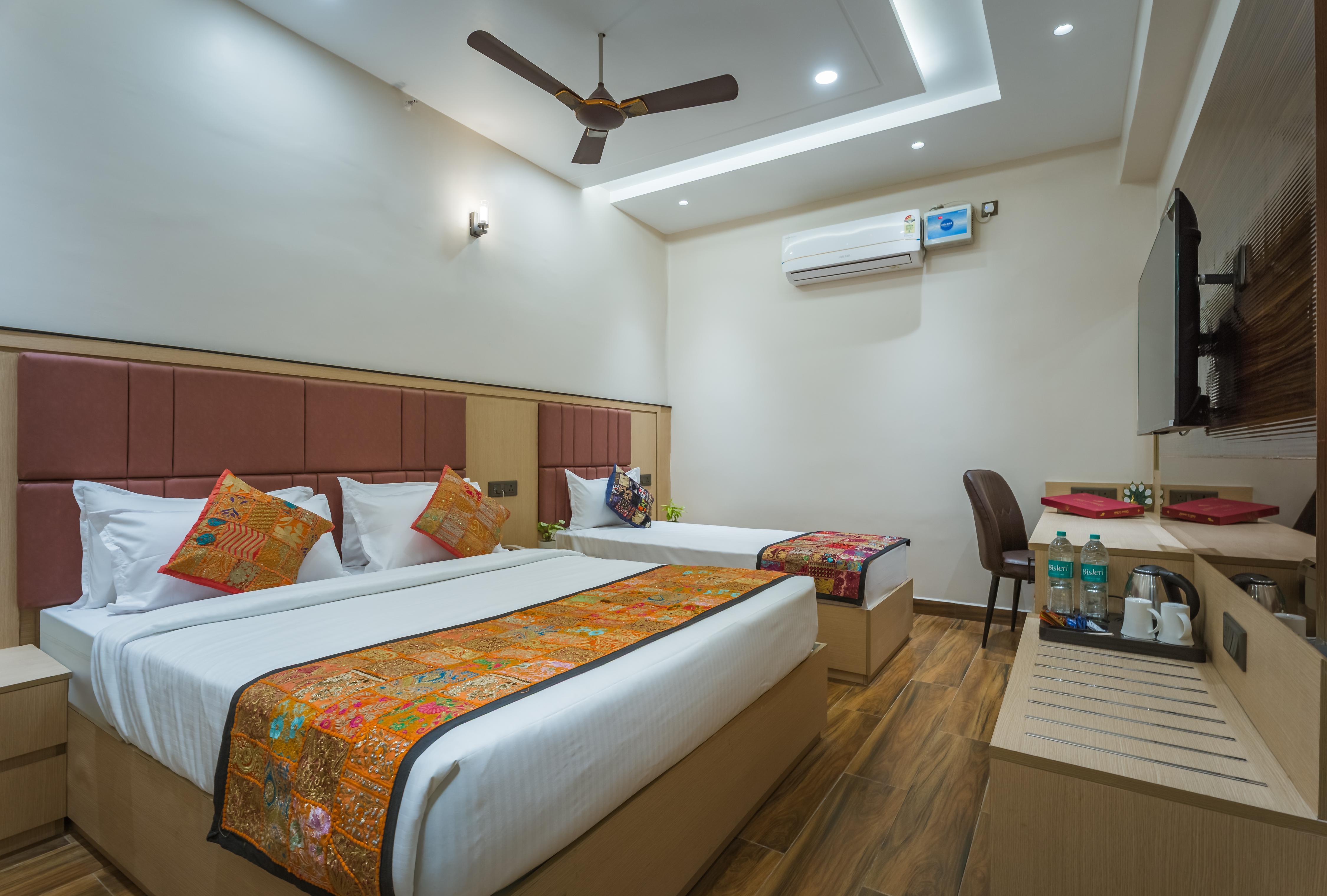 Tripli Hotels Tandon Grand Stay - Tap to explore photos
