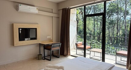 Coorg Homes. Room Type - Family Room with Balcony Coorg Homes. Room Type - Family Room with Balcony