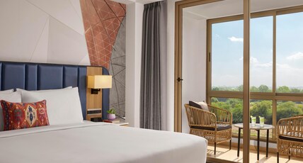 Hyatt Place Vithalapur Room Type - POOL VIEW SUITE, 1 KING BED, BALCONY
