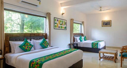 Treebo Blue River With Swimming Pool Room Type - Spacious Premium Room