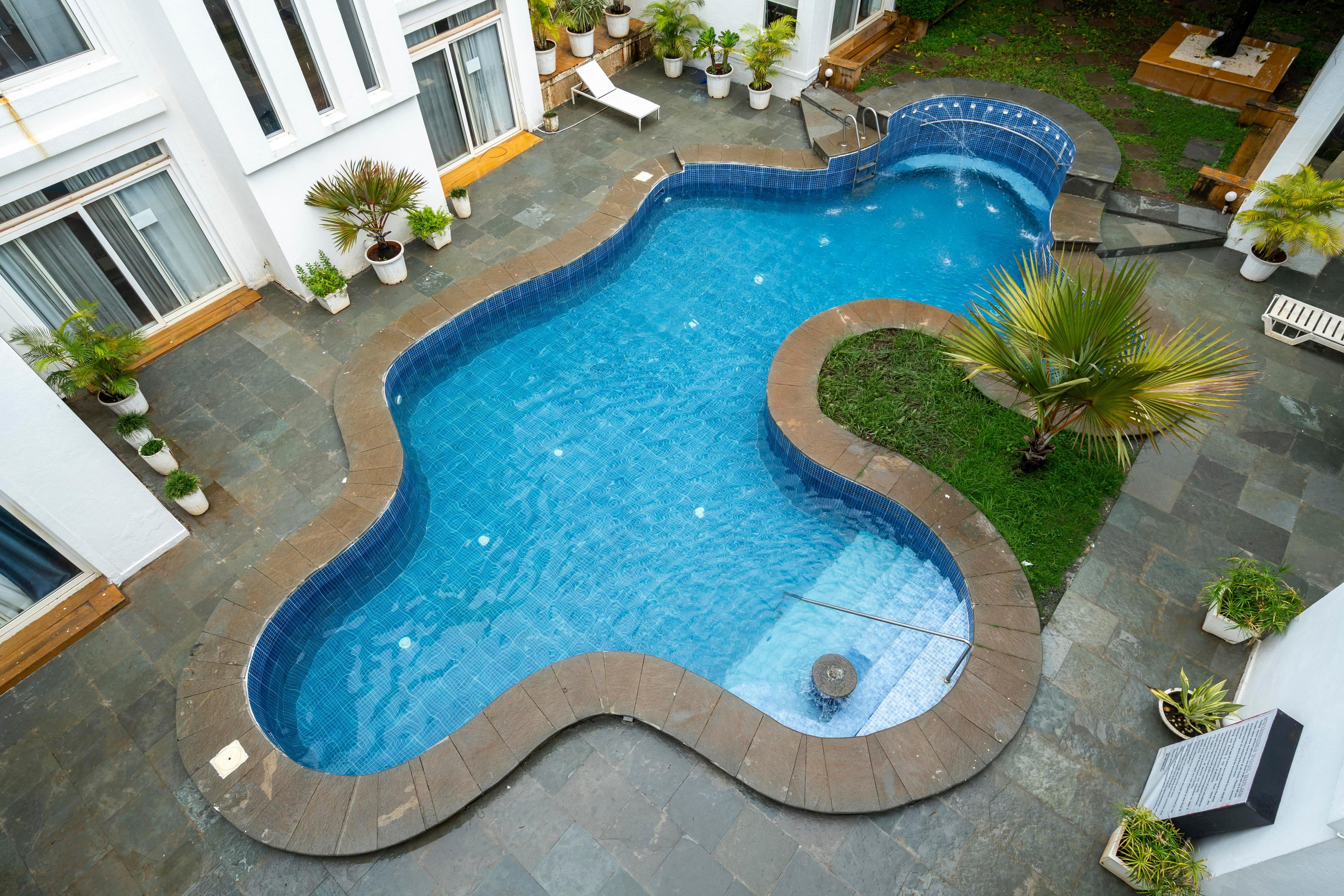 Staymaster Taram | 4BR with Pool Near Candolim Beach - Tap to explore photos