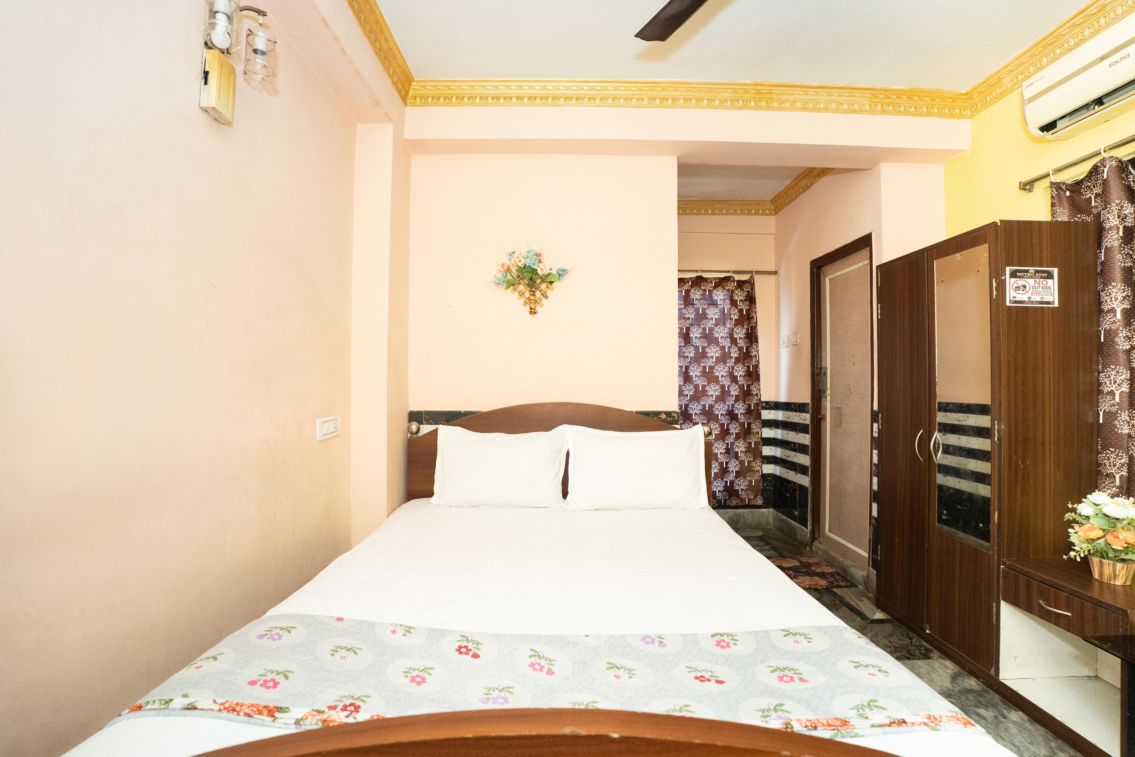 Metro Stay Guest House - Tap to explore photos