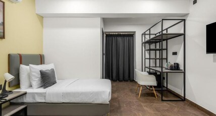 HOTEL COMFORT N STAY 1RK Room Type - Deluxe Triple Bed Room