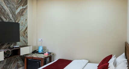 HOTEL OMKARA VIEW PALACE Room Type - Deluxe Tripple Room