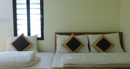 KUMARI RESIDENCY Room Type - Deluxe Triple Room