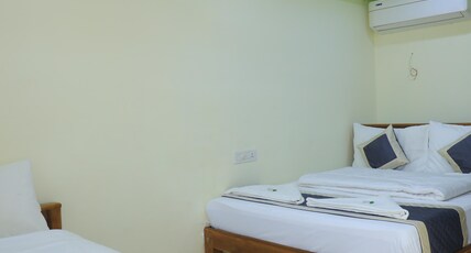 KUMARI RESIDENCY Room Type - Deluxe Triple Room